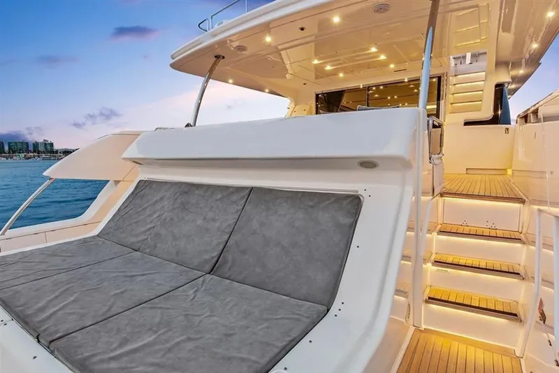 Lontano Yacht Photos Pics Luxurious 2016 Ferretti 960 yacht with elegant deck and seating at sunset.