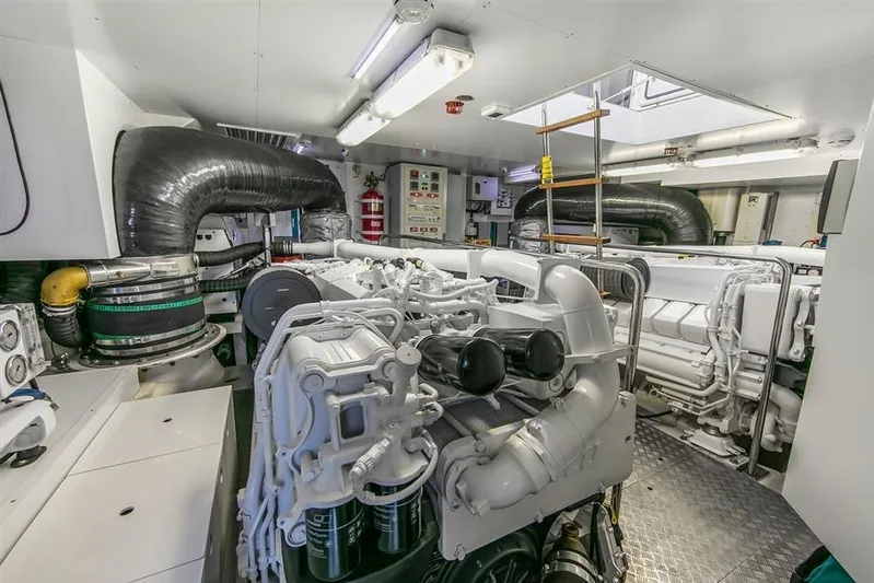 Lontano Yacht Photos Pics Engine room of a 2016 Ferretti 960 yacht, showcasing advanced machinery and equipment.