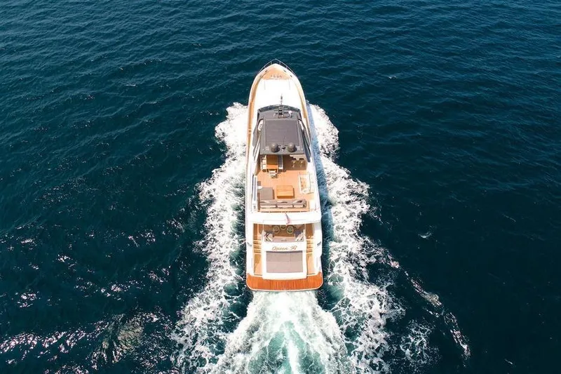 Lontano Yacht Photos Pics Aerial view of 2016 Ferretti 960 yacht cruising on open sea.
