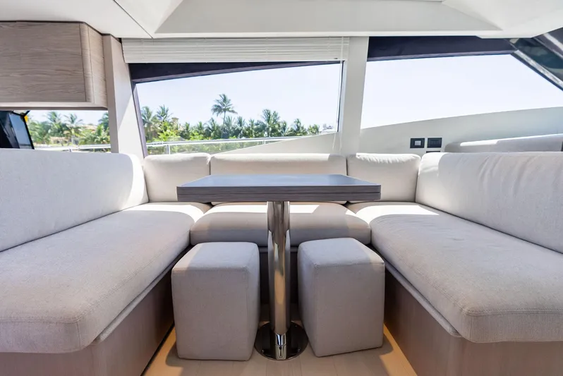 Ferretti 500 Yacht Photos Pics Luxurious interior of 2024 Ferretti Yachts 500 with elegant seating and table.