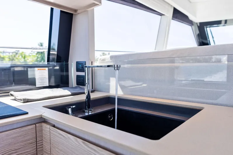 Ferretti 500 Yacht Photos Pics Modern kitchen sink on 2024 Ferretti Yachts 500, featuring sleek design and ample natural light.