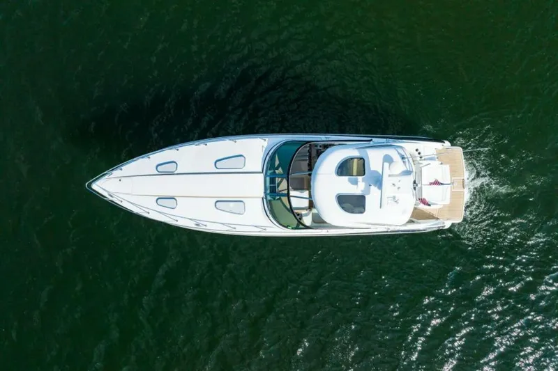 Dev Ocean Yacht Photos Pics Aerial view of a 2014 Formula 400 Super Sport boat cruising on water.