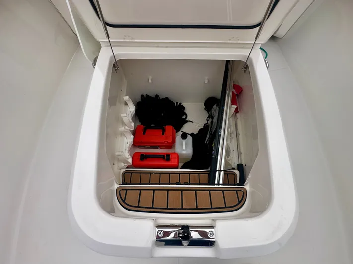  Yacht Photos Pics Storage compartment of a 2019 Boston Whaler 280 Outrage with equipment and supplies.