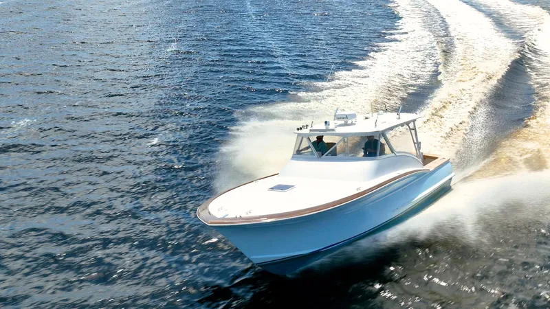 Here Fishy Fishy Yacht Photos Pics 2012 Winter Custom Yachts 38 Express cruising on open water.