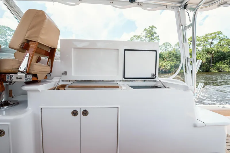 Here Fishy Fishy Yacht Photos Pics 2012 Winter Custom Yachts 38 Express yacht interior with open storage compartments.