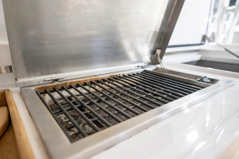 Here Fishy Fishy Yacht Photos Pics Stainless steel grill on 2012 Winter Custom Yachts 38 Express boat.