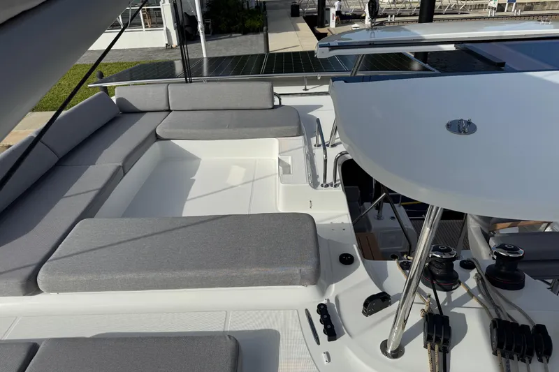  Yacht Photos Pics Luxurious 2026 Lagoon 43 yacht deck with comfortable seating and modern design.