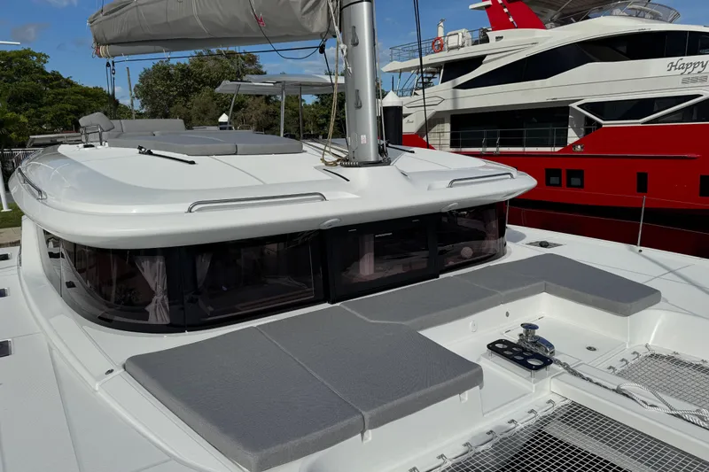  Yacht Photos Pics 2026 Lagoon 43 catamaran with sleek design, spacious deck, and modern amenities.