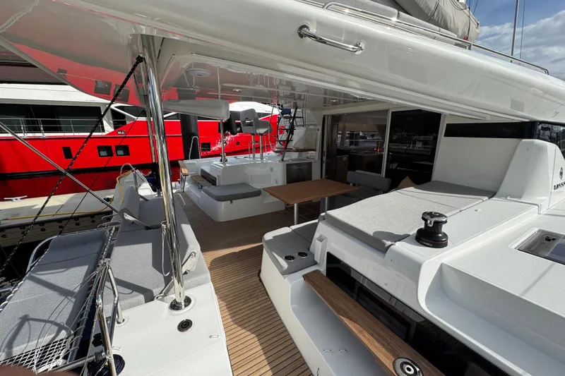  Yacht Photos Pics Luxurious 2026 Lagoon 43 yacht interior with modern seating and sleek design.