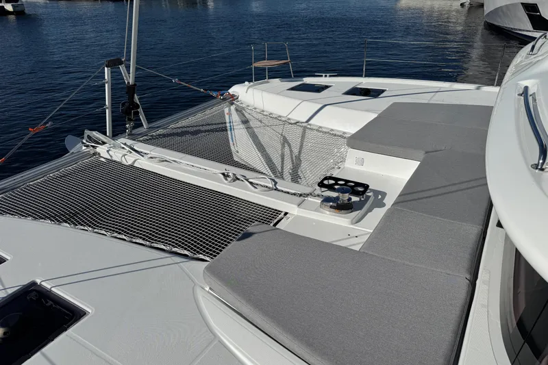  Yacht Photos Pics Modern Lagoon 43 yacht deck with netting and seating, 2026 model.