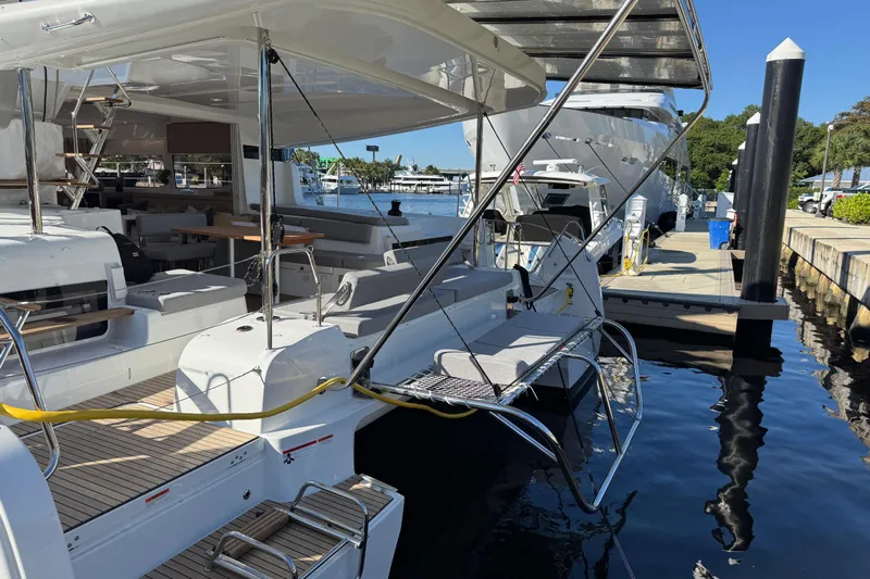 Yacht Photos Pics Luxury Lagoon 43 yacht docked at marina, showcasing sleek design, 2026 model.