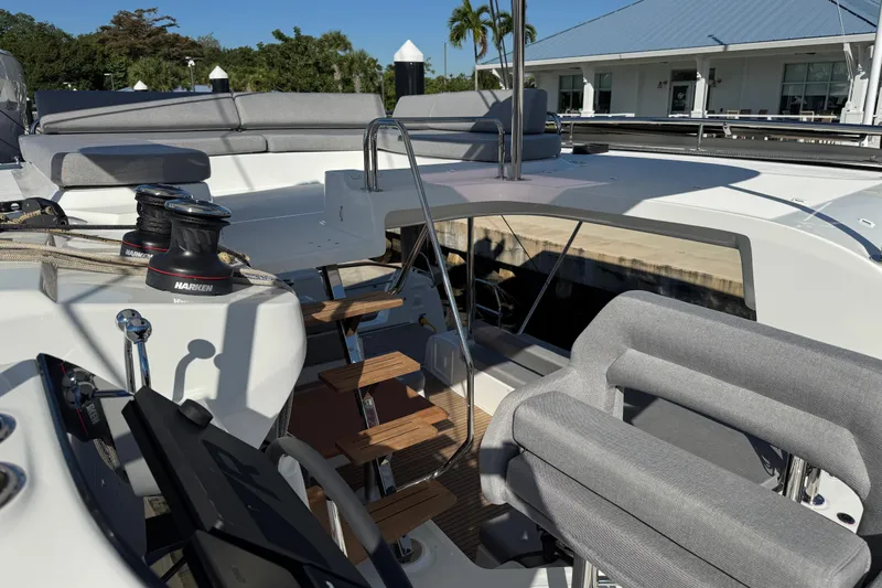  Yacht Photos Pics Modern Lagoon 43 yacht deck with seating, winches, and helm, 2026 model.