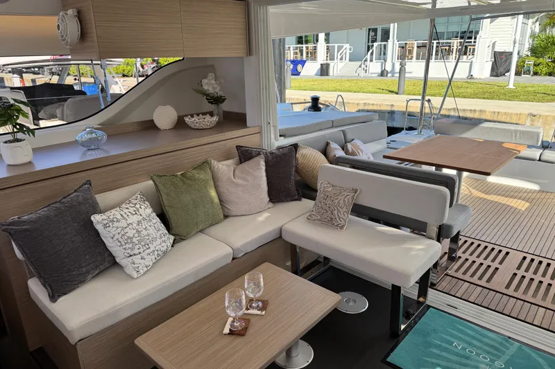  Yacht Photos Pics Luxurious interior of 2026 Lagoon 43 yacht with elegant seating and decor.