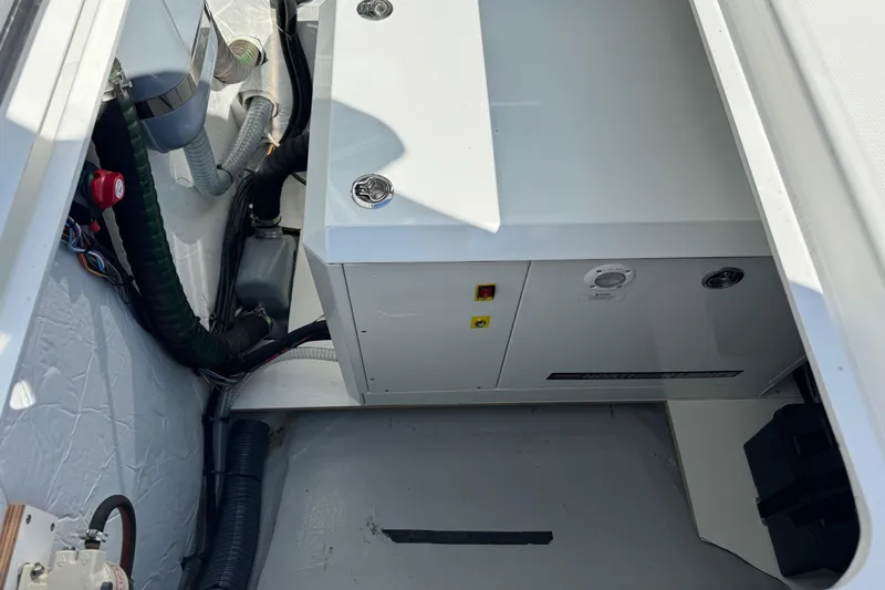  Yacht Photos Pics Engine compartment of 2026 Lagoon 43 boat with visible wiring and components.