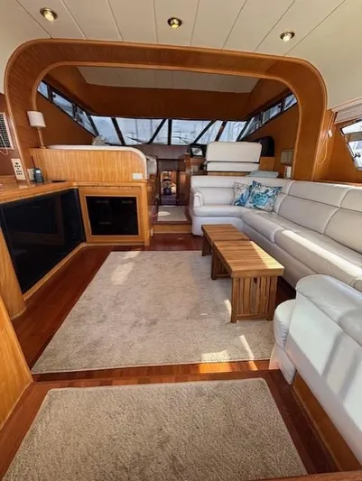 Marsea Yacht Photos Pics Luxurious interior of a 1994 Johnson High Tech Euro 56 yacht with elegant wood and leather furnishings.
