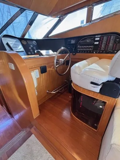Marsea Yacht Photos Pics Cockpit of 1994 Johnson High Tech Euro 56 yacht with wooden interior and control panel.