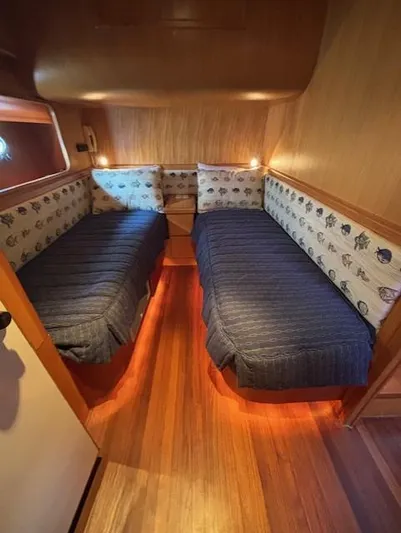 Marsea Yacht Photos Pics Cozy twin cabin in 1994 Johnson High Tech Euro 56 yacht with wooden interior.
