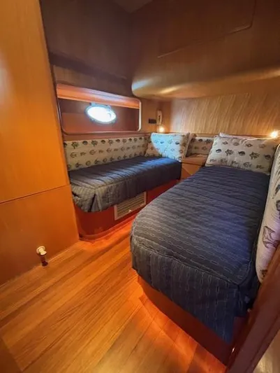 Marsea Yacht Photos Pics Twin cabin with wooden interior in 1994 Johnson High Tech Euro 56 yacht.