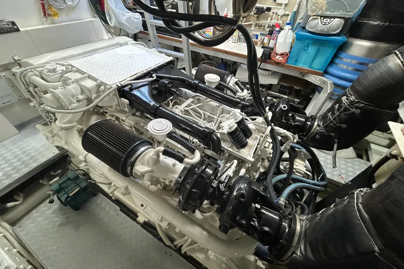 Gabriela G Yacht Photos Pics Engine room of a 2001 Mangusta 72 yacht, showcasing detailed mechanical components.