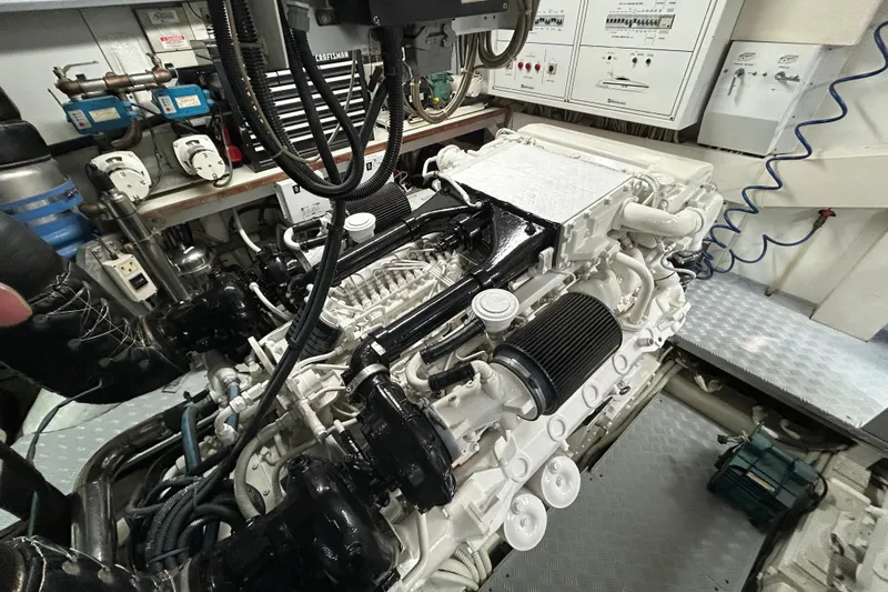 Gabriela G Yacht Photos Pics Engine room of a 2001 Mangusta 72 yacht, showcasing detailed machinery and components.