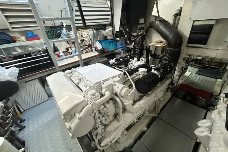 Gabriela G Yacht Photos Pics Engine room of a 2001 Mangusta 72 yacht, showcasing a well-maintained engine.
