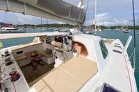 Luxurious 2004 Custom BBL 54' yacht with spacious deck and scenic marina view.