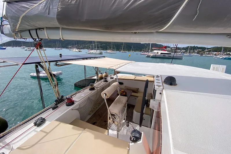  Yacht Photos Pics Sailing yacht deck view, Custom BBL 54', 2004, anchored in a scenic marina.