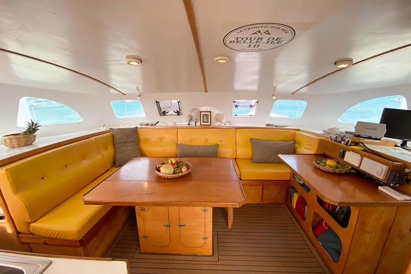  Yacht Photos Pics Luxurious interior of 2004 Custom BBL 54' yacht with cozy seating and dining area.