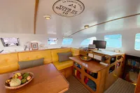 Luxurious interior of 2004 Custom BBL 54' yacht with cozy seating and modern amenities.