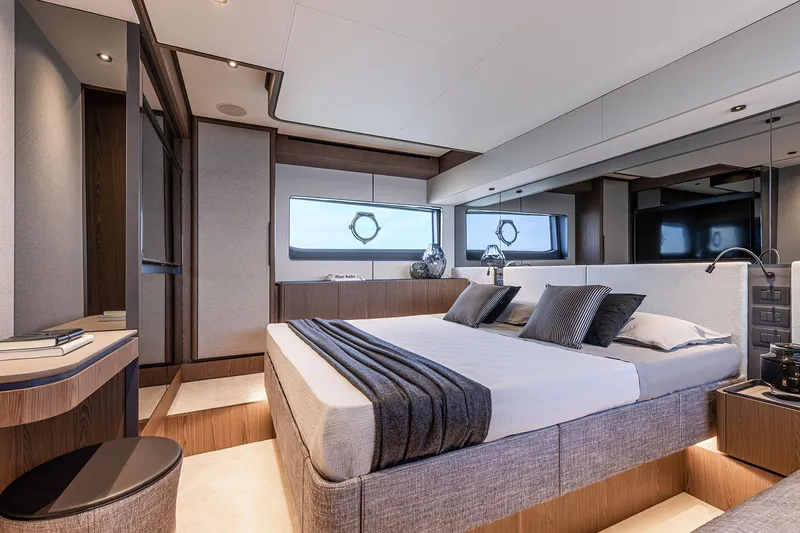 Our Trade Yacht Photos Pics Luxurious bedroom interior of 2024 Ferretti Yachts 580, featuring modern design and elegant furnishings.