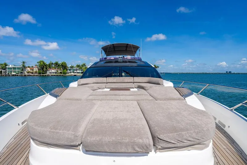 Cocoon Yacht Photos Pics Luxurious 2021 Princess S78 yacht with spacious sunbathing area on a sunny day.