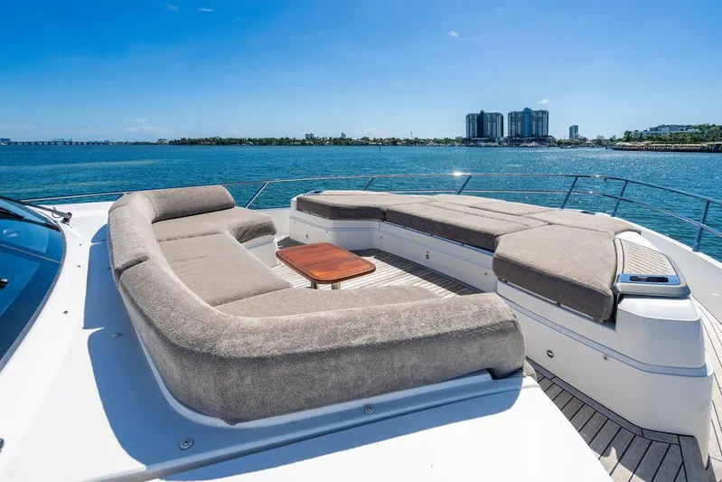 Cocoon Yacht Photos Pics Luxurious 2021 Princess S78 yacht deck with plush seating and ocean view.