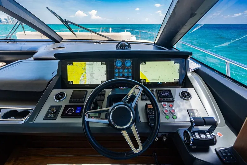 Cocoon Yacht Photos Pics Helm of 2021 Princess S78 yacht with navigation screens and ocean view.