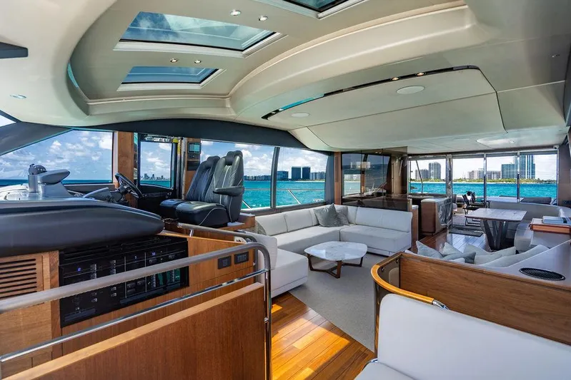 Cocoon Yacht Photos Pics Luxurious interior of 2021 Princess S78 yacht with panoramic ocean views and modern furnishings.