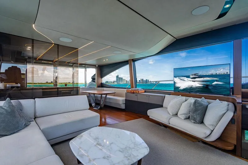 Cocoon Yacht Photos Pics Luxurious interior of 2021 Princess S78 yacht with modern seating and ocean view.