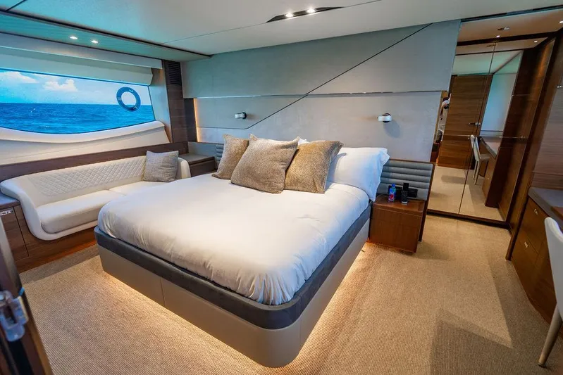 Cocoon Yacht Photos Pics Luxurious bedroom interior of 2021 Princess S78 yacht with ocean view.