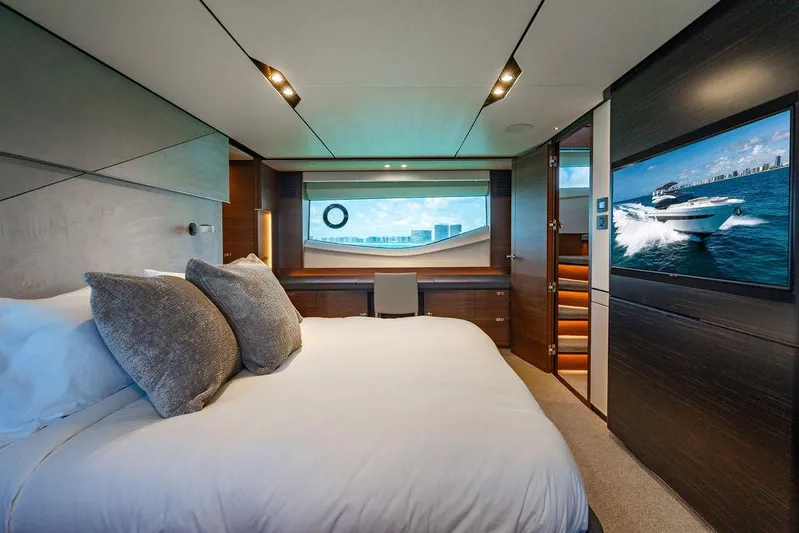 Cocoon Yacht Photos Pics Luxurious bedroom interior of 2021 Princess S78 yacht with modern decor and ocean view.