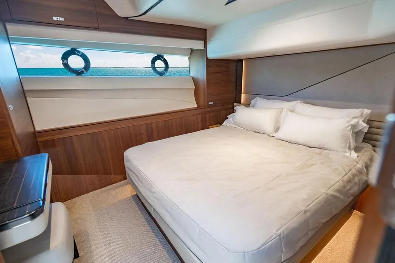 Cocoon Yacht Photos Pics Luxurious bedroom interior of 2021 Princess S78 yacht with ocean view.