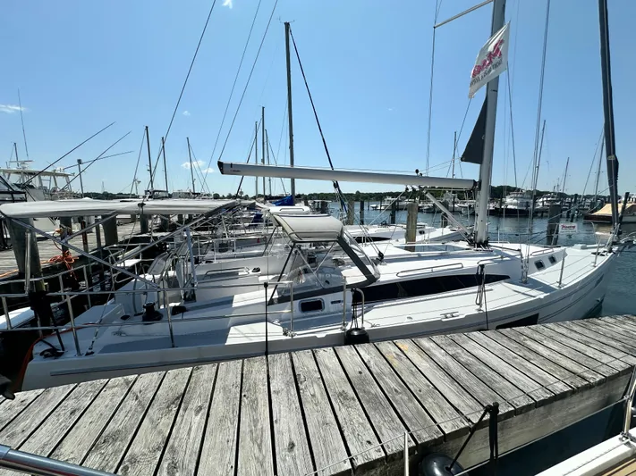 C426 #115 Yacht Photos Pics 2025 Catalina 426 sailboat docked at marina under clear blue sky.