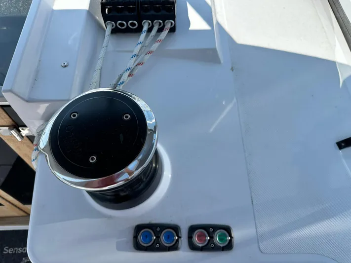 C426 #115 Yacht Photos Pics Control panel of a 2025 Catalina 426 sailboat with winch and buttons.