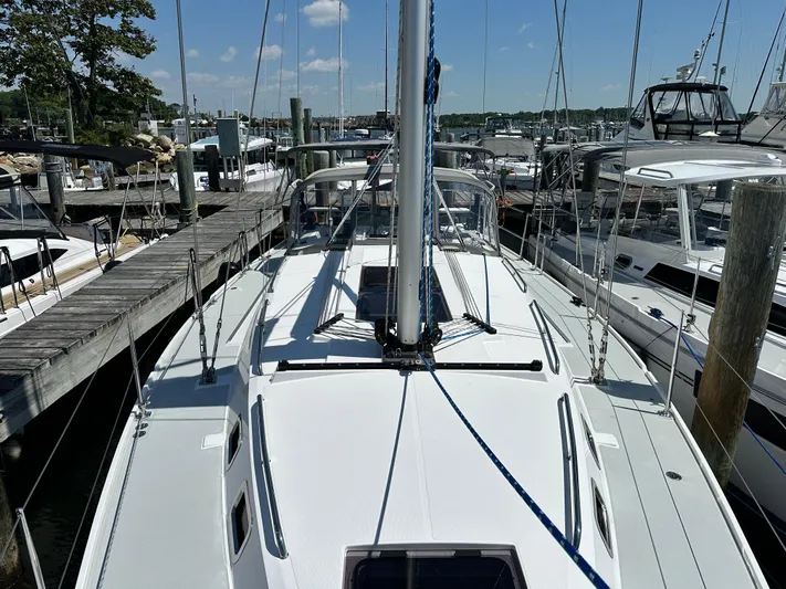 C426 #115 Yacht Photos Pics Sailboat Catalina 426, 2025 model, docked at marina under clear blue sky.