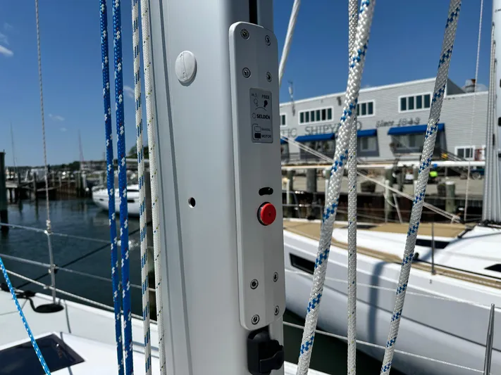 C426 #115 Yacht Photos Pics Close-up of Catalina 426 sailboat mast with ropes and control panel, dockside view.