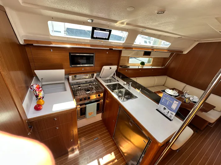 C426 #115 Yacht Photos Pics Luxurious Catalina 426 yacht interior with modern kitchen and seating, 2025 model.