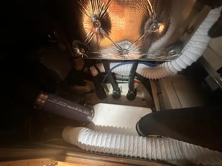 C426 #115 Yacht Photos Pics Engine compartment of a 2025 Catalina 426 with insulated components and ventilation hoses.