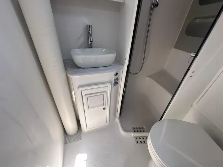 C426 #115 Yacht Photos Pics Modern bathroom in 2025 Catalina 426 yacht with sink, shower, and toilet.