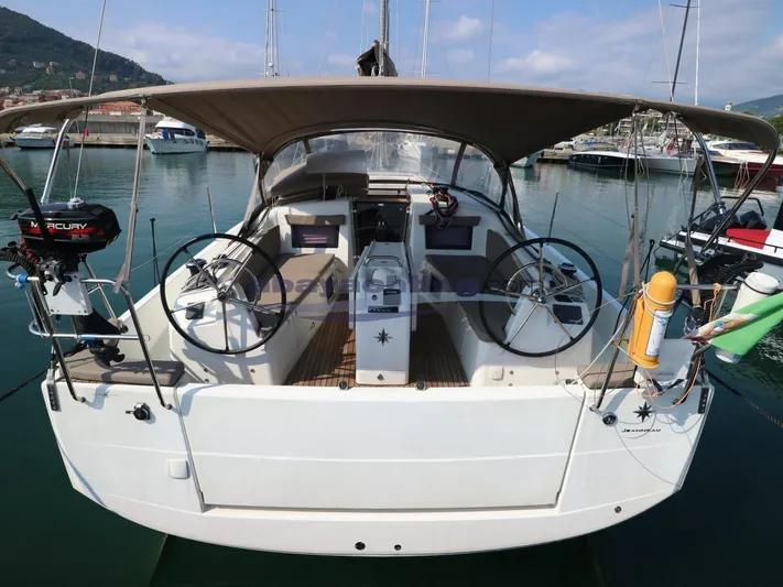  Yacht Photos Pics Jeanneau Sun Odyssey 410, 2019 model, docked at marina with dual steering wheels.