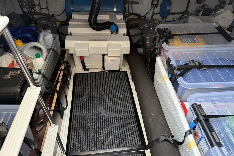 F50199 Yacht Photos Pics Engine room of 2024 Princess F50 yacht with organized storage and equipment.