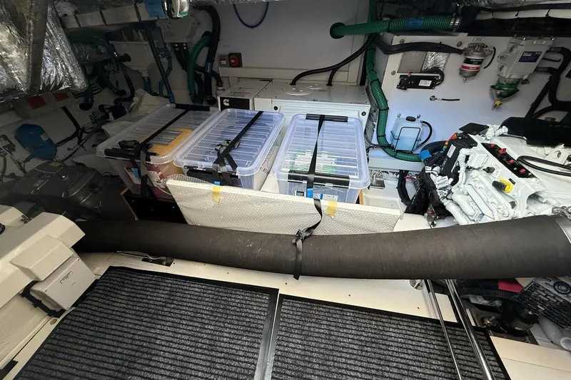 F50199 Yacht Photos Pics Engine room of 2024 Princess F50 yacht with organized storage and mechanical components.