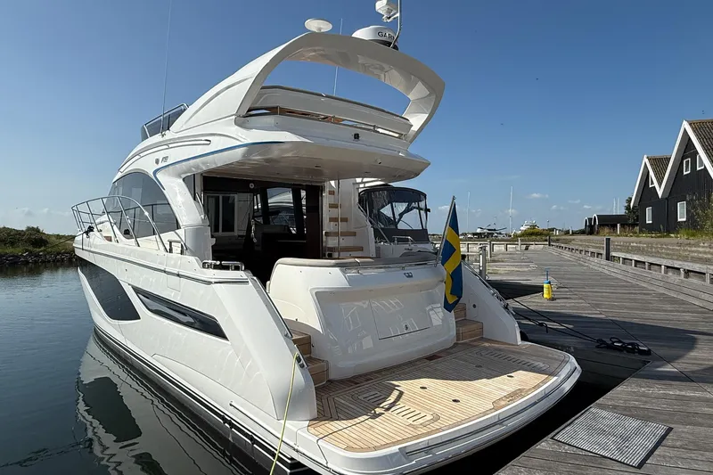 F50199 Yacht Photos Pics 2024 Princess F50 yacht docked, showcasing sleek design and luxury features.