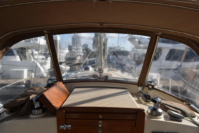 Promises Yacht Photos Pics Cockpit view of 1998 Island Packet 350 sailboat docked at marina.